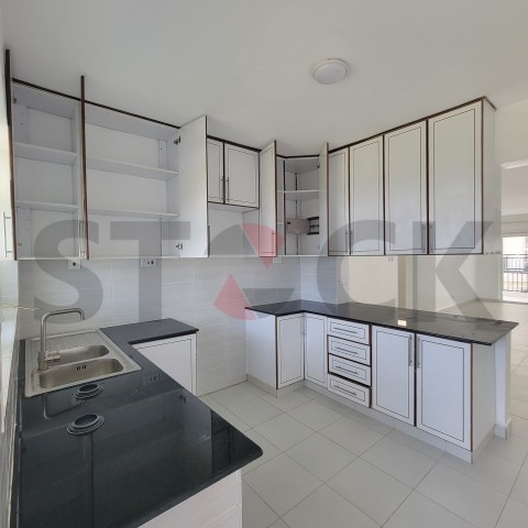 Kitchen with white cabinets